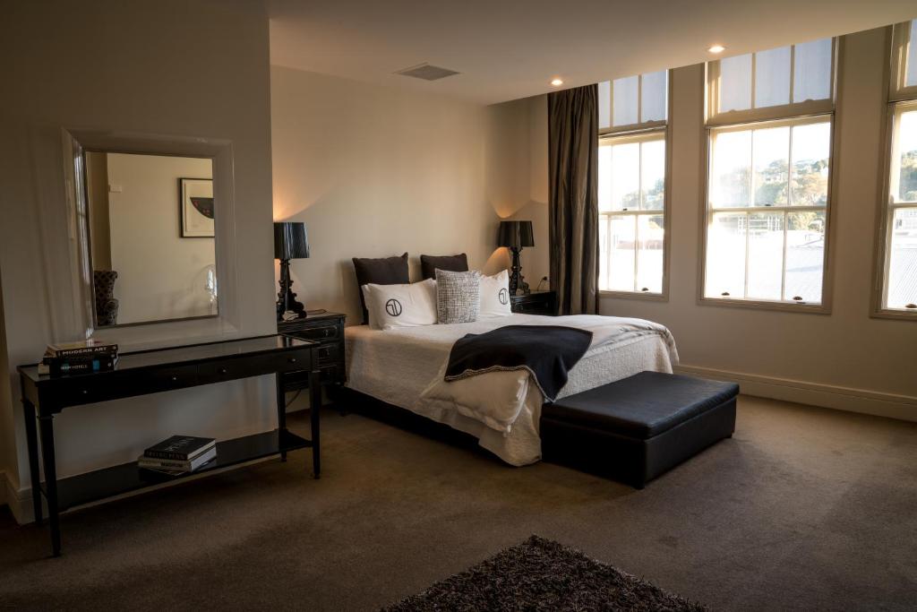 Postel nebo postele na pokoji v ubytování The Dome Boutique Apartments