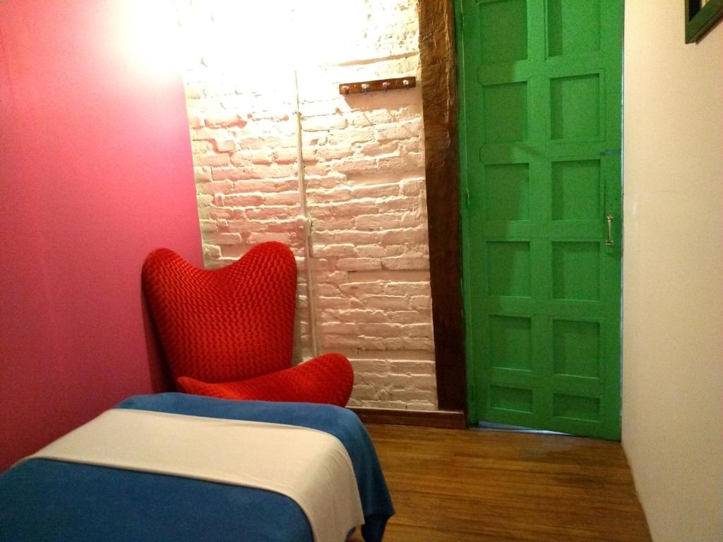 Postel nebo postele na pokoji v ubytování Lima Limon Candelaria Hostel