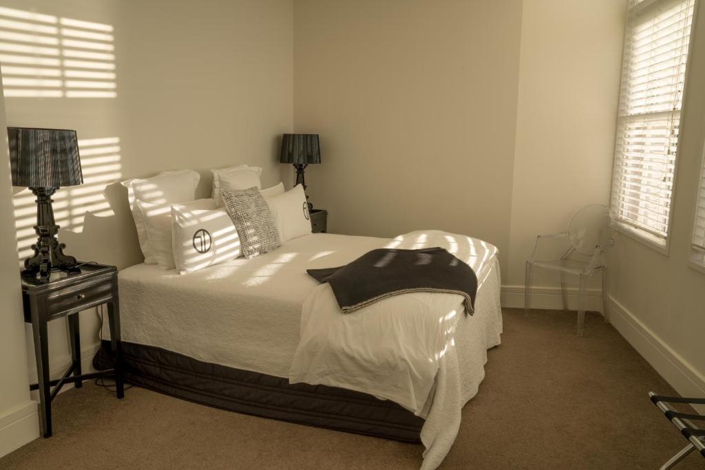 Postel nebo postele na pokoji v ubytování The Dome Boutique Apartments