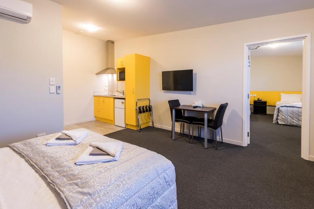 Postel nebo postele na pokoji v ubytování C-Motel