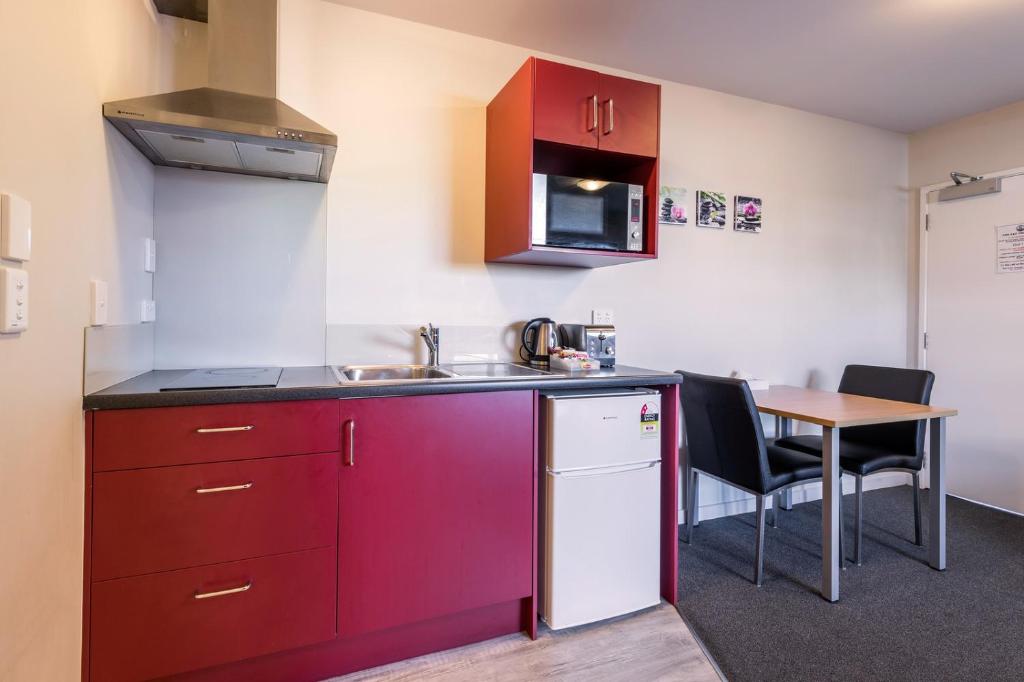 Kuchyň nebo kuchyňský kout v ubytování C-Motel