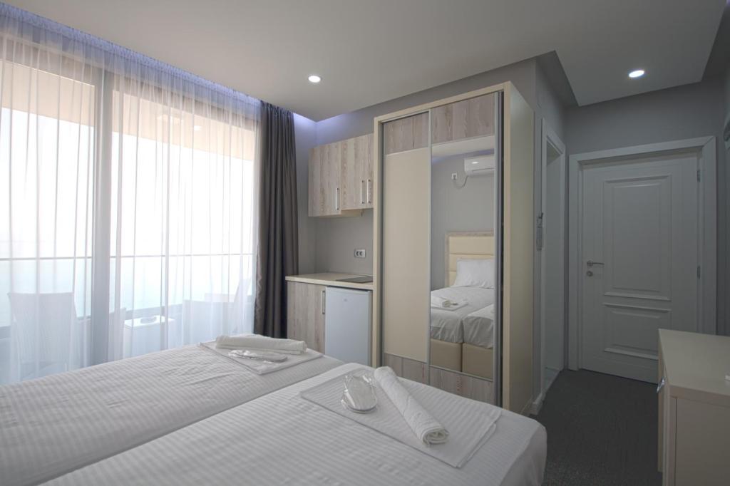 Postel nebo postele na pokoji v ubytování Guesthouse Montex