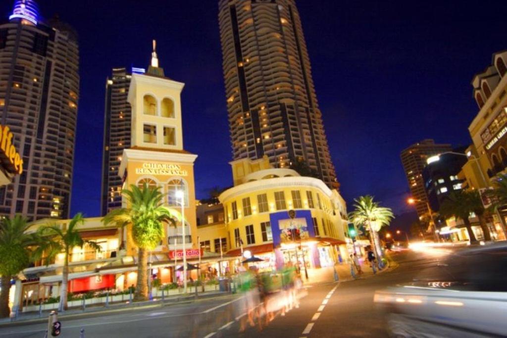 a city street at night with tall buildings at The Towers of Chevron Renaissance - Holidays Gold Coast in Gold Coast