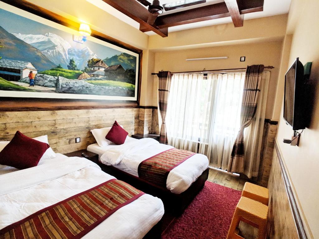 A bed or beds in a room at Hotel Forest Lake Backpackers' Hostel