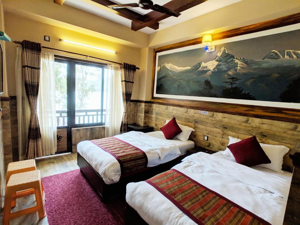 A bed or beds in a room at Hotel Forest Lake Backpackers' Hostel