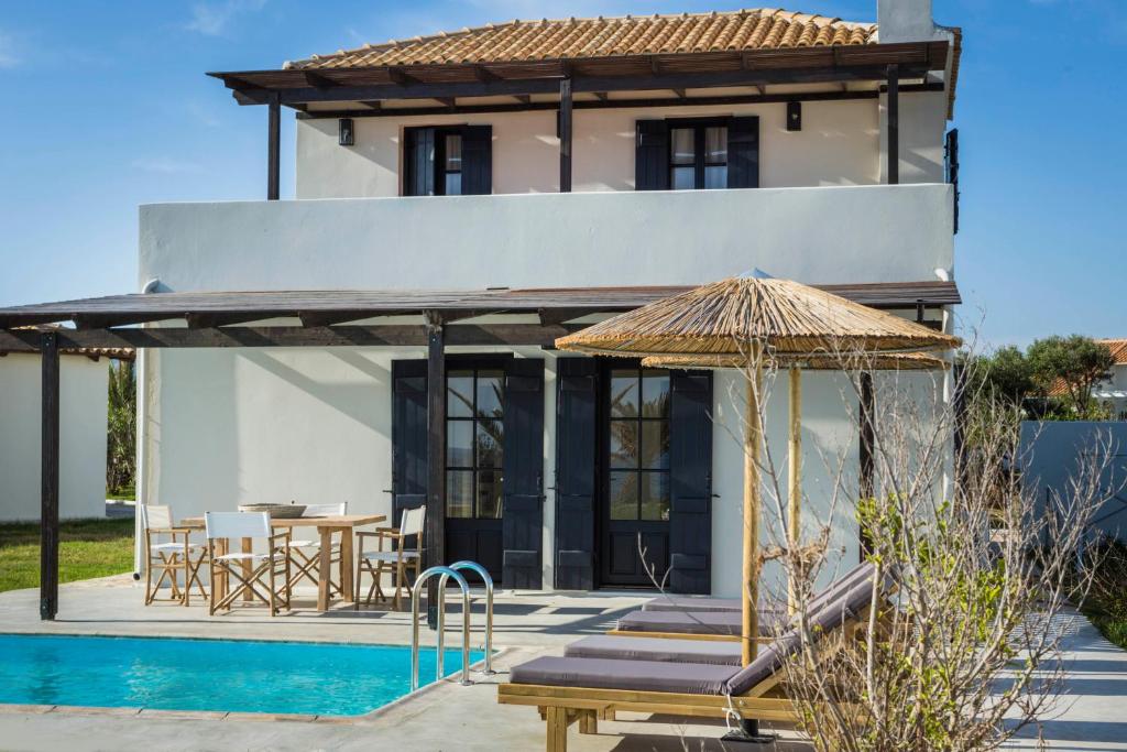 Πισίνα στο ή κοντά στο Kymata Bohemian Villas