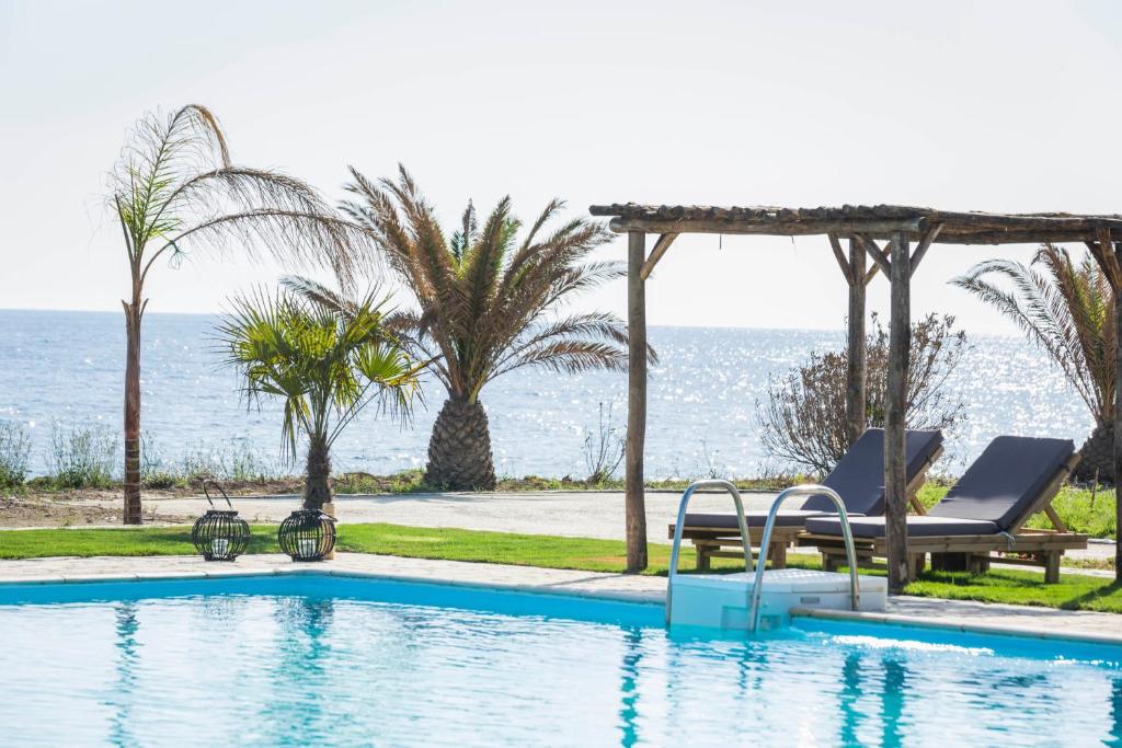 Πισίνα στο ή κοντά στο Kymata Bohemian Villas