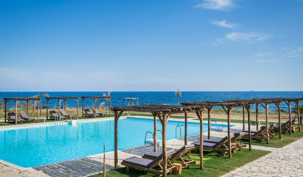 Πισίνα στο ή κοντά στο Kymata Bohemian Villas