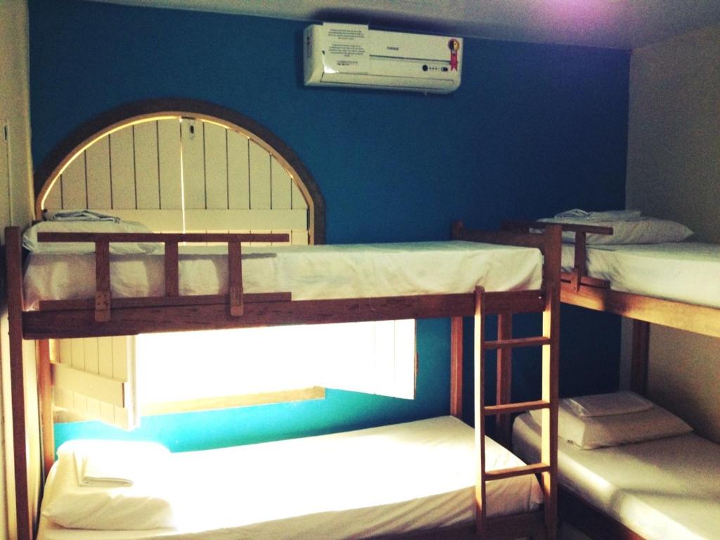 Postel nebo postele na pokoji v ubytování Cosmopolitan Hostel
