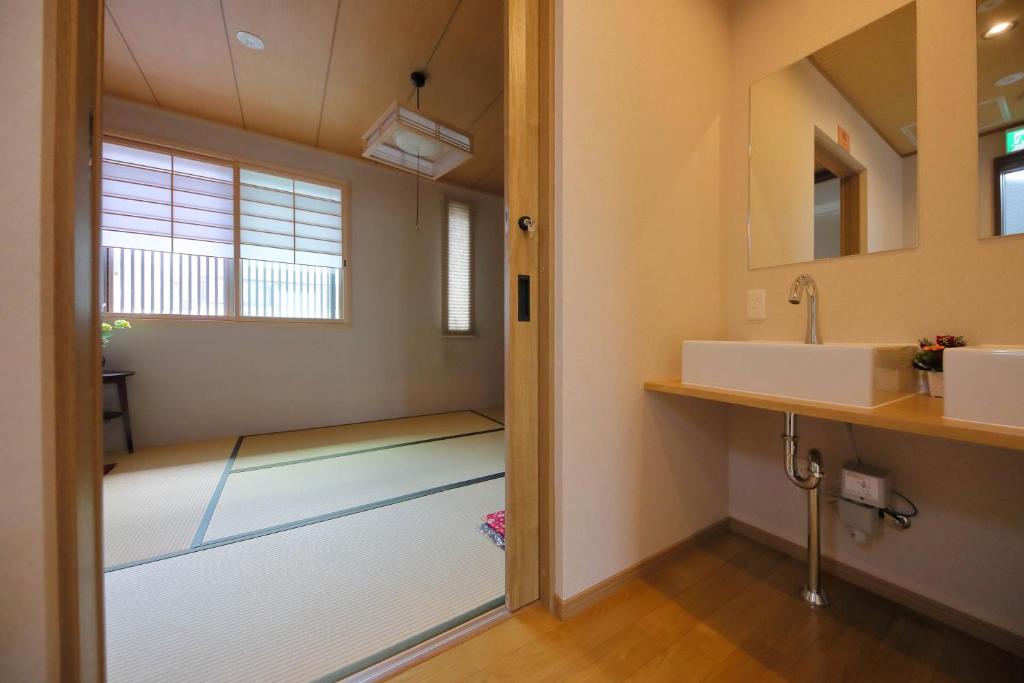 Koupelna v ubytování Kyo Machiya Ryokan Yuan