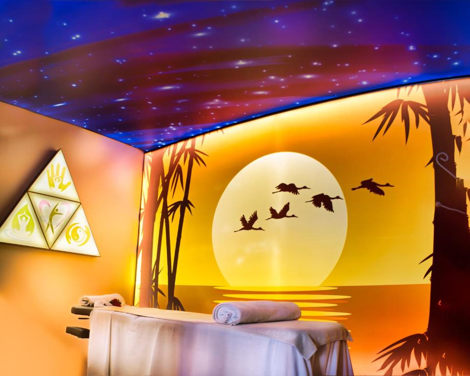 Posteľ alebo postele v izbe v ubytovaní Hotel Parque Tropical