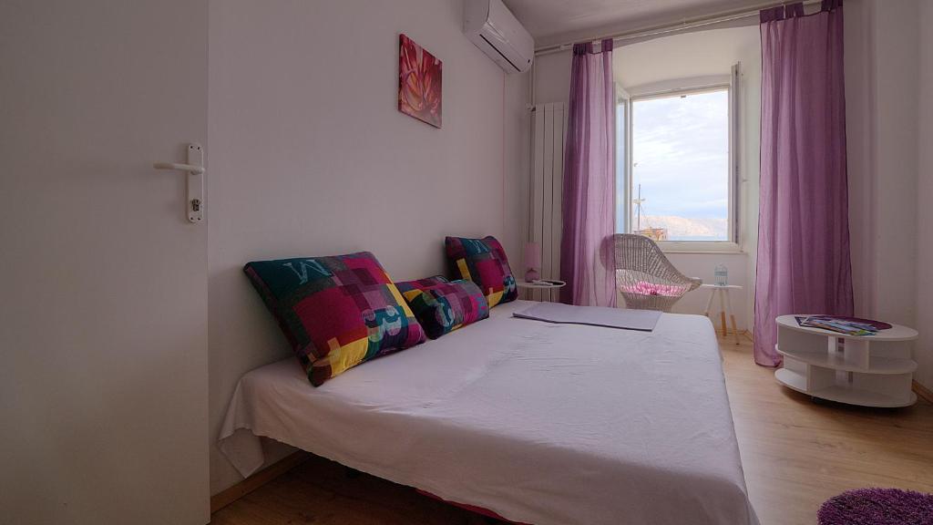 Postel nebo postele na pokoji v ubytování Apartments & Rooms Josephine