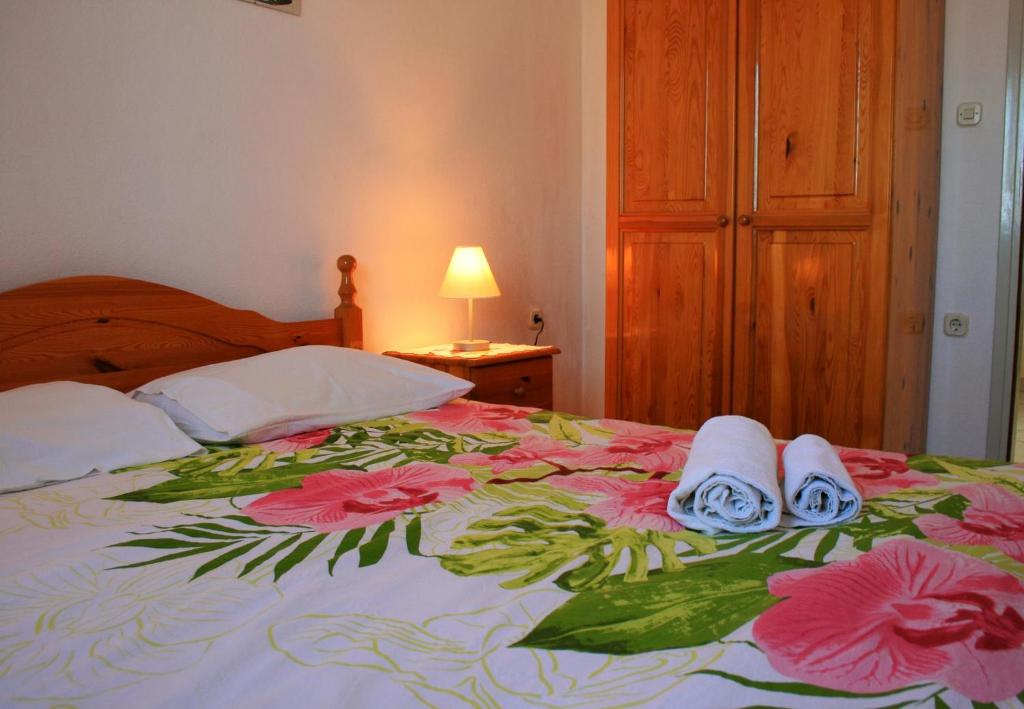 Posteľ alebo postele v izbe v ubytovaní Apartments Jakšić