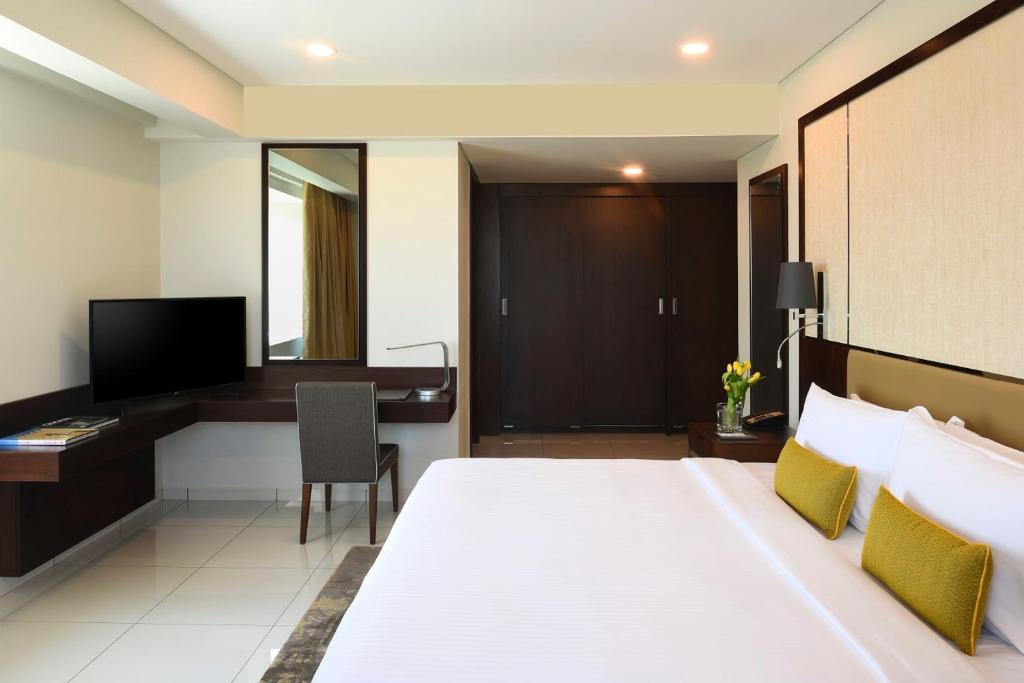 TV o dispositivi per l'intrattenimento presso Fraser Suites Muscat
