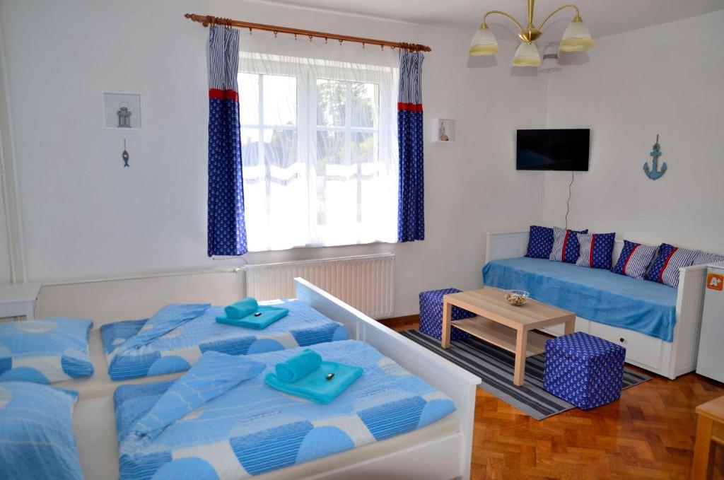 Postel nebo postele na pokoji v ubytování Vila Kateřina