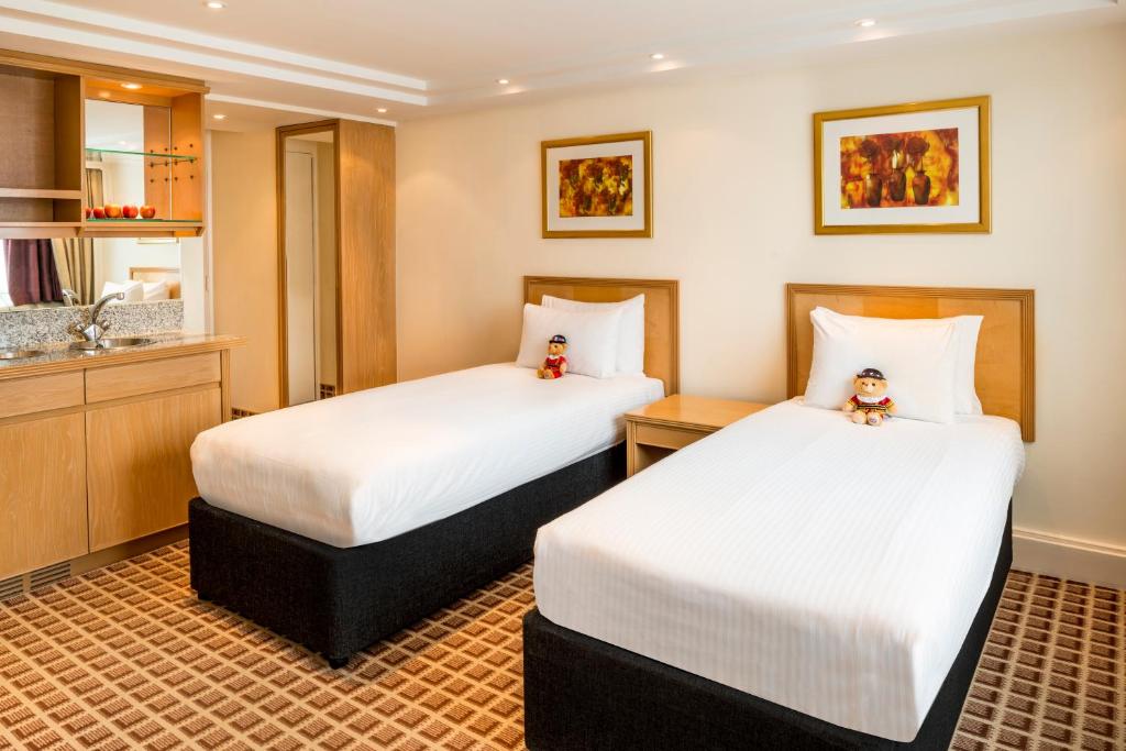 Postel nebo postele na pokoji v ubytování Copthorne Tara Hotel London Kensington