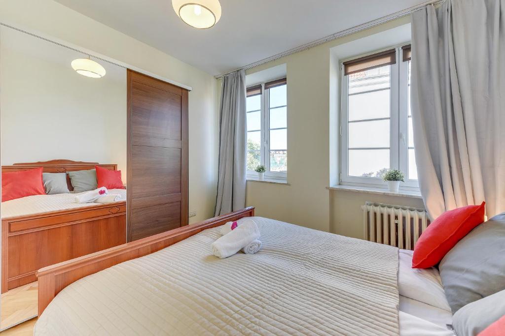 Posteľ alebo postele v izbe v ubytovaní Apartments By The River - Gdańsk Old Town by Noclegi Renters