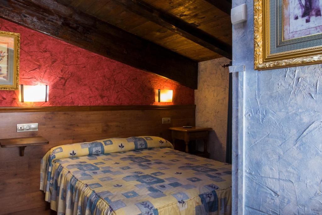 Postel nebo postele na pokoji v ubytování Hotel Rural Bidean