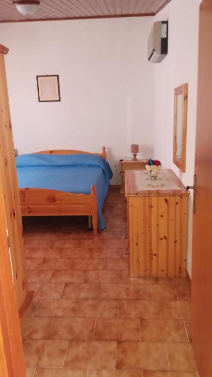 Letto o letti in una camera di Affittacamere S' Eremu