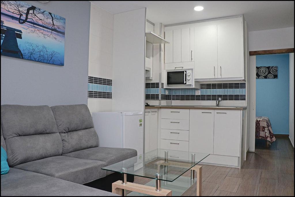 Kuchyň nebo kuchyňský kout v ubytování Apartamento Baluarte III