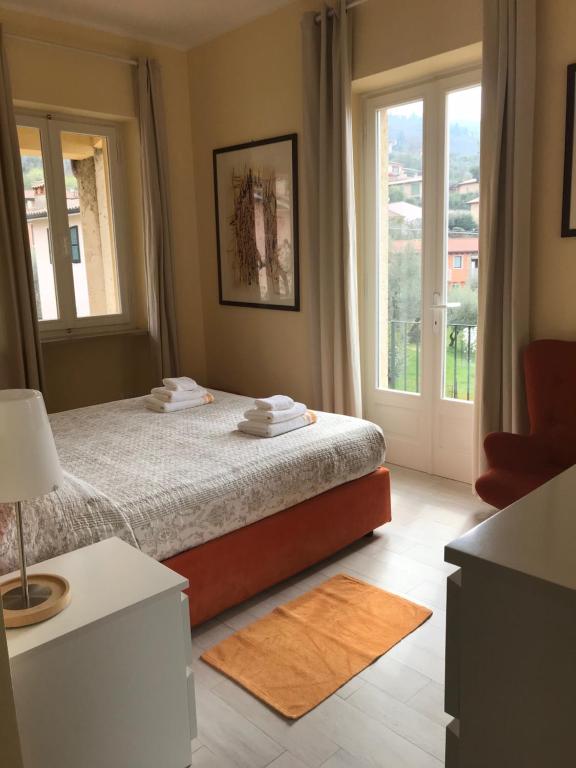Posteľ alebo postele v izbe v ubytovaní Residenza Le Logge
