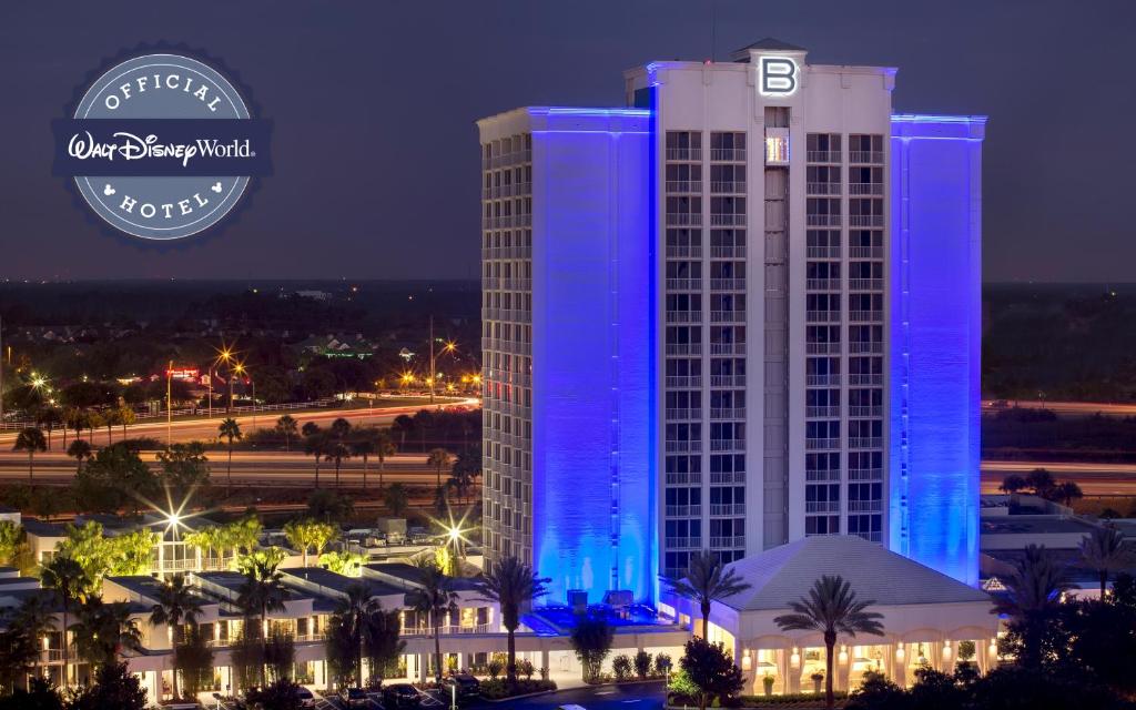a building with blue lights on it at night at B Resort and Spa Located in Disney Springs Resort Area in Orlando