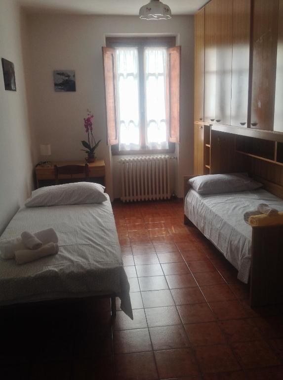 Posteľ alebo postele v izbe v ubytovaní Casa Giulia
