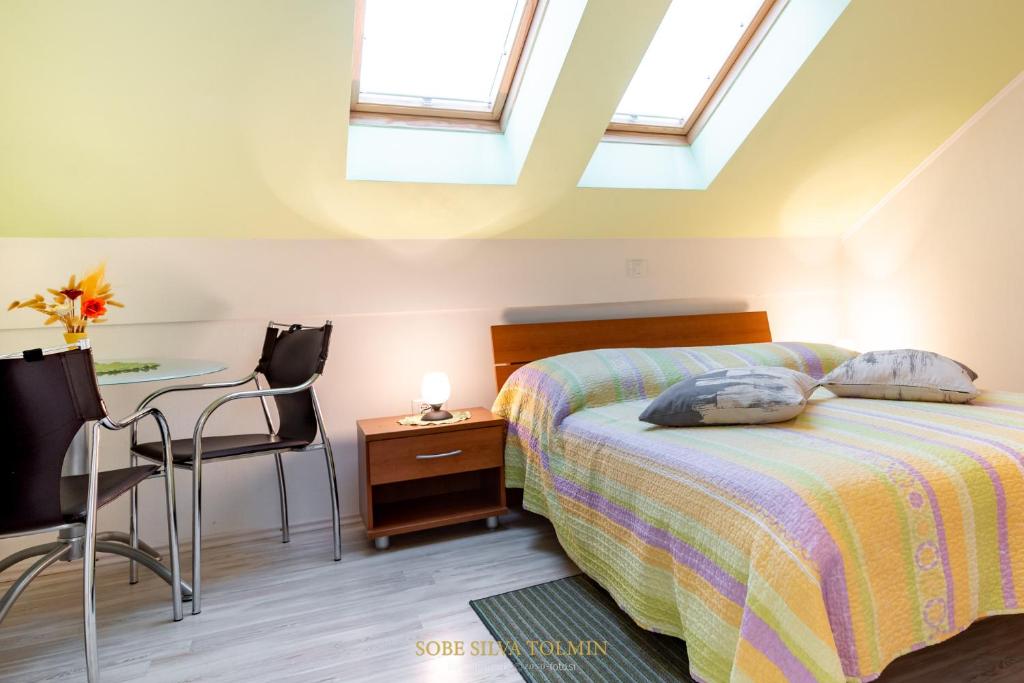 Postel nebo postele na pokoji v ubytování Guesthouse Sobe Silva