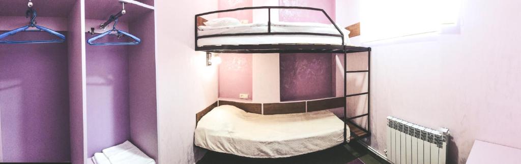 Postel nebo postele na pokoji v ubytování DownTown B&B