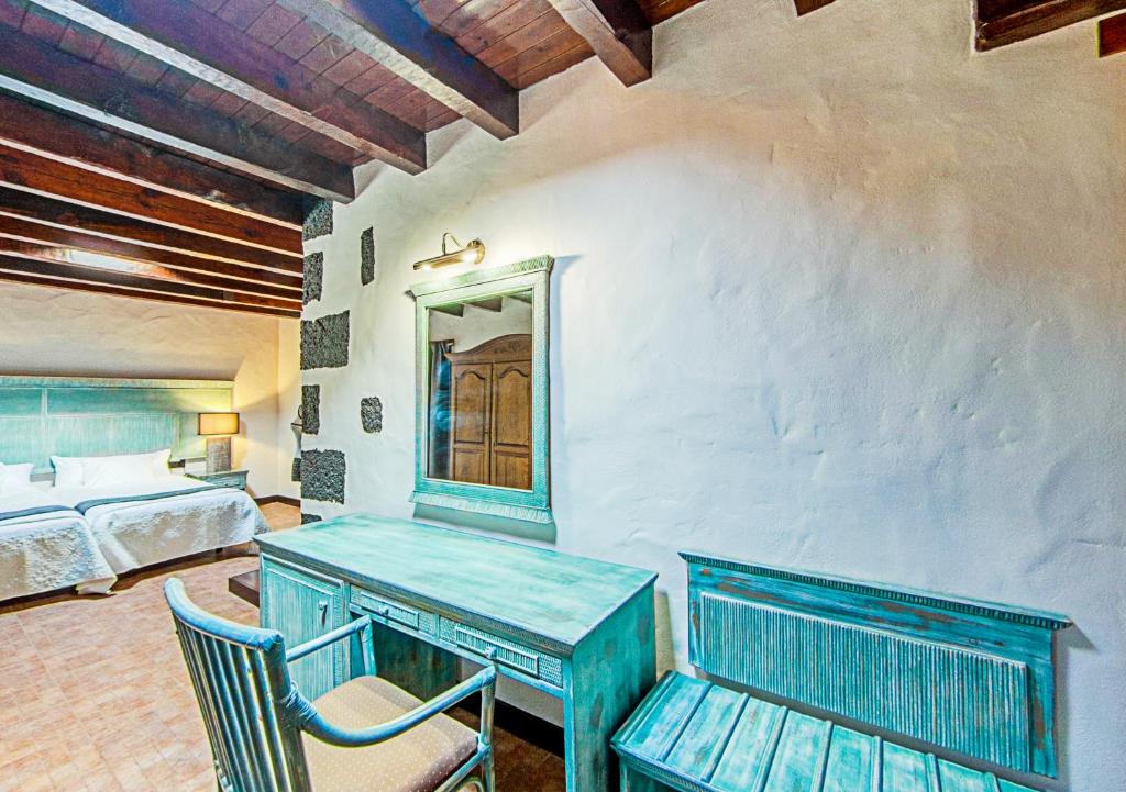 A bed or beds in a room at Apartamentos Rurales Islas Canarias