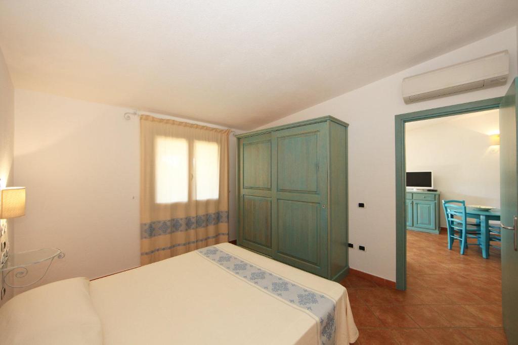Postel nebo postele na pokoji v ubytování Residenza Marginetto
