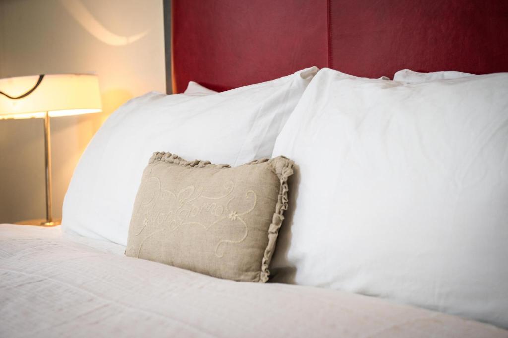 Postel nebo postele na pokoji v ubytování Hotel Minturn