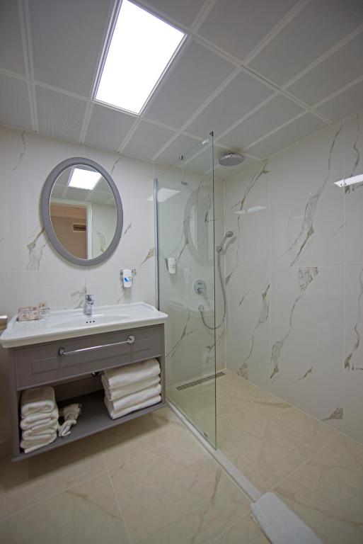 Ванная комната в Motto Premium Hotel&Spa