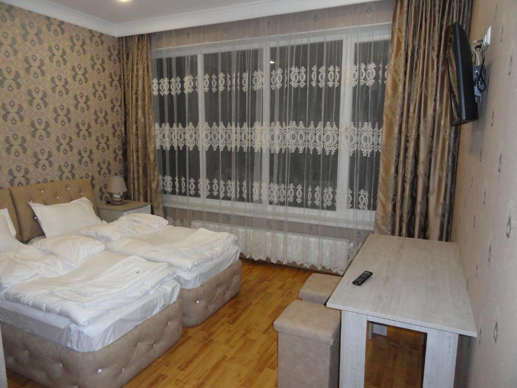Letto o letti in una camera di Sonya