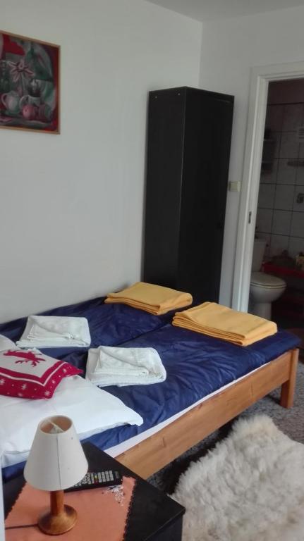 Posteľ alebo postele v izbe v ubytovaní Pokoje goscinne na Gasienicowym Potoku