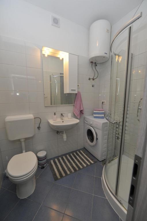 Kúpeľňa v ubytovaní Apartman Mirakul