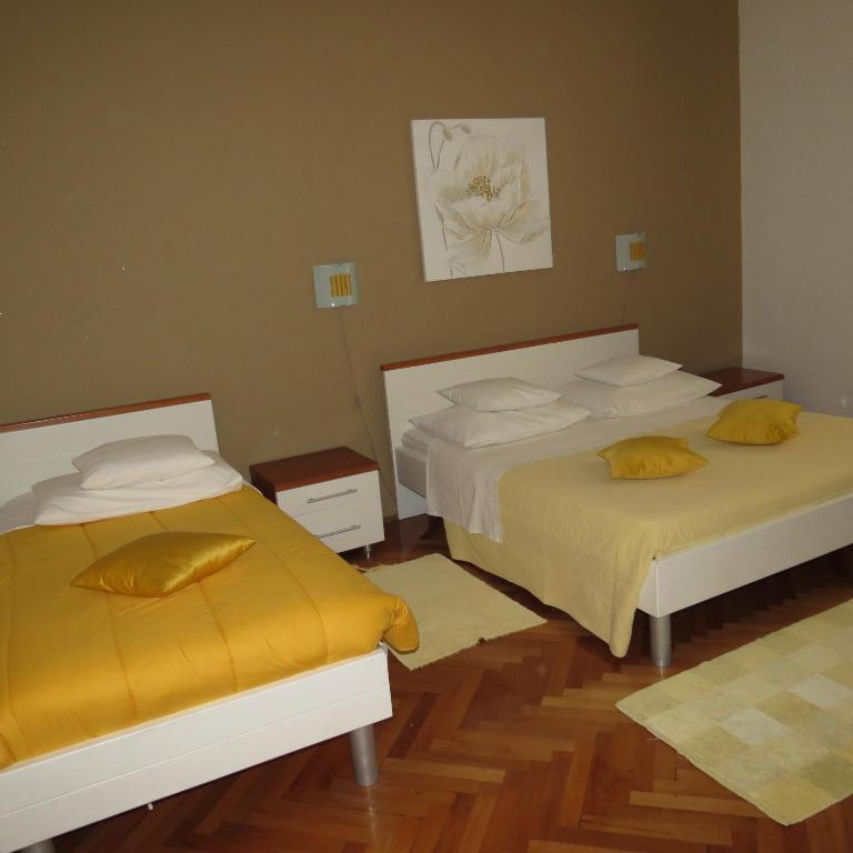 Postel nebo postele na pokoji v ubytování Guesthouse Vrlic