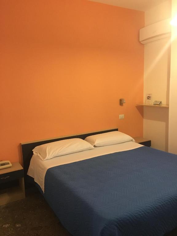 Postel nebo postele na pokoji v ubytování Piccolo Hotel Lamezia