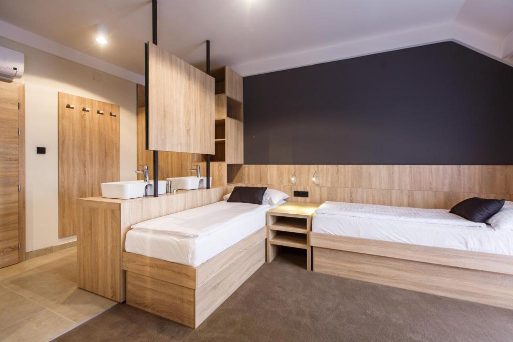 Postel nebo postele na pokoji v ubytování Luxury Suites Bellevue