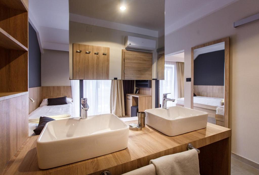 Postel nebo postele na pokoji v ubytování Luxury Suites Bellevue