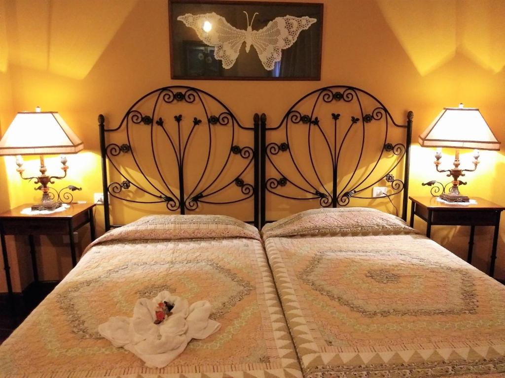 Ένα ή περισσότερα κρεβάτια σε δωμάτιο στο Casa Rural Bella Vista