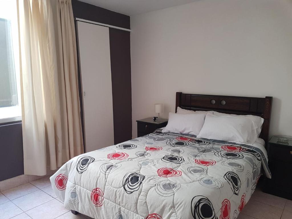 Postel nebo postele na pokoji v ubytování Hospedaje de Lidia