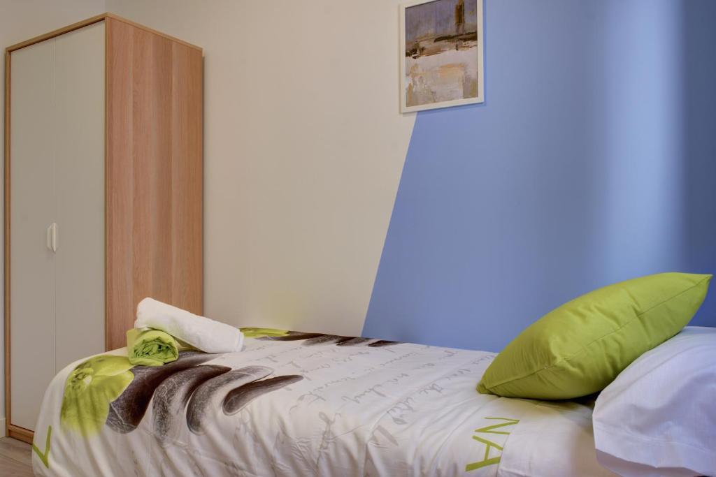 Postel nebo postele na pokoji v ubytování Apartamentos San Lázaro 2