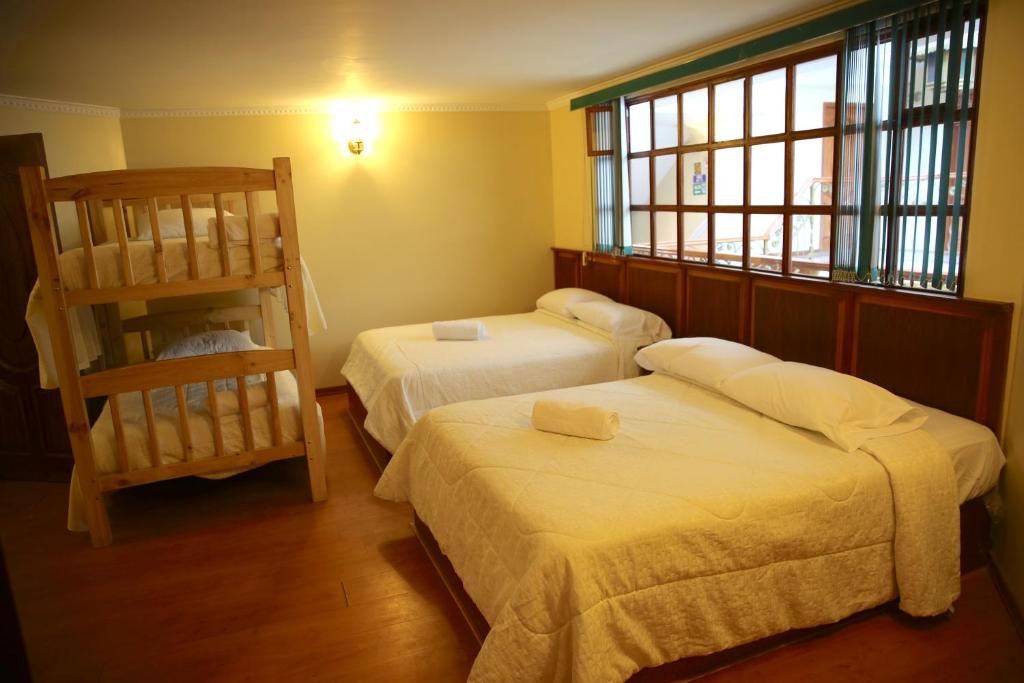 Postel nebo postele na pokoji v ubytování Hotel Donde Marcelo