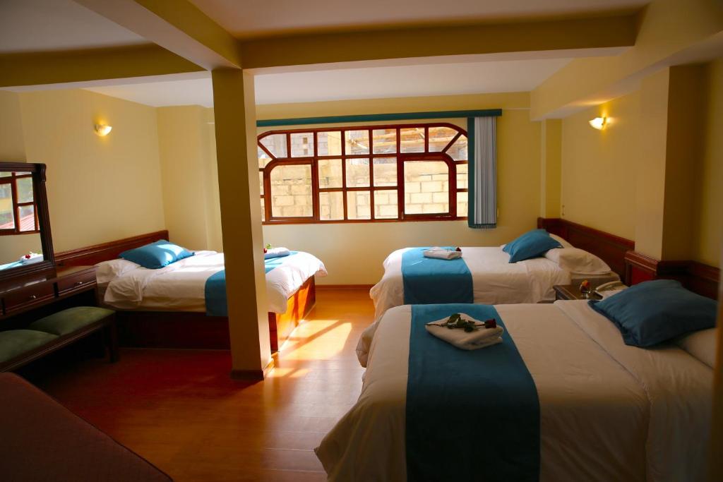 Postel nebo postele na pokoji v ubytování Hotel Donde Marcelo