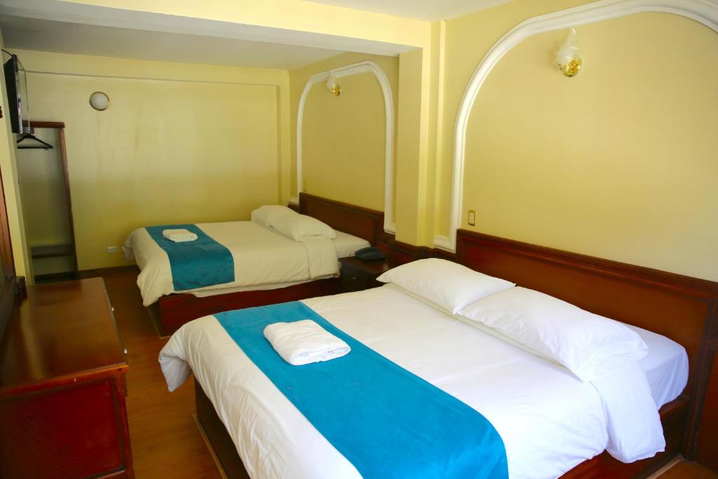 Postel nebo postele na pokoji v ubytování Hotel Donde Marcelo