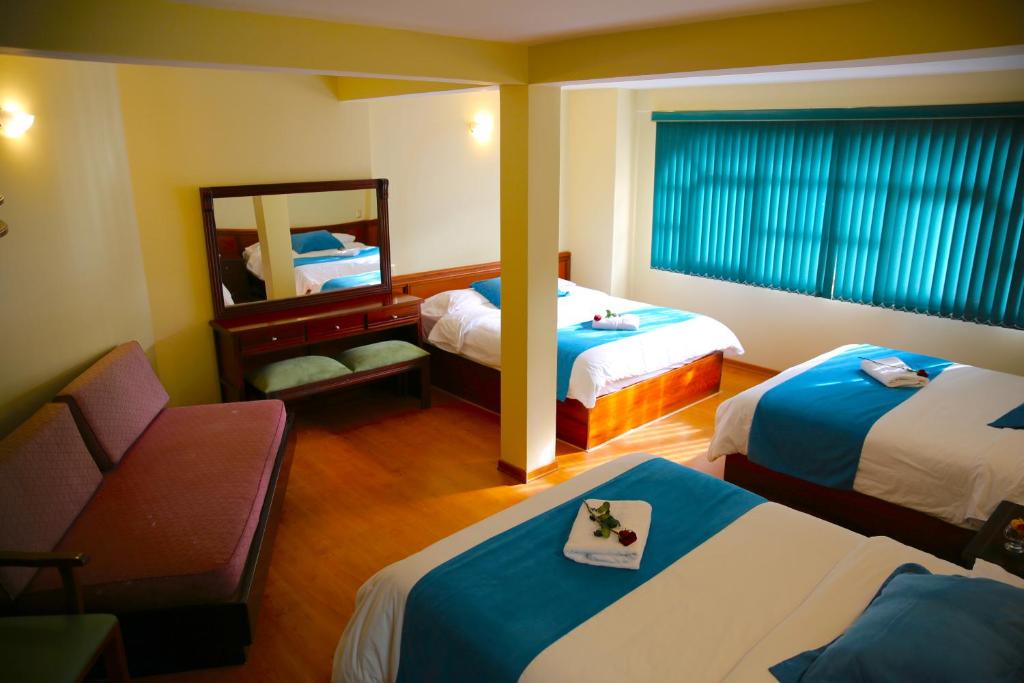 Postel nebo postele na pokoji v ubytování Hotel Donde Marcelo