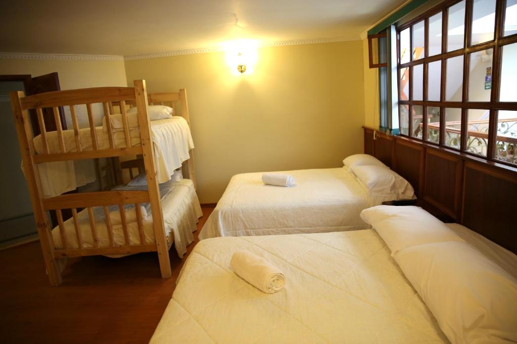 Postel nebo postele na pokoji v ubytování Hotel Donde Marcelo
