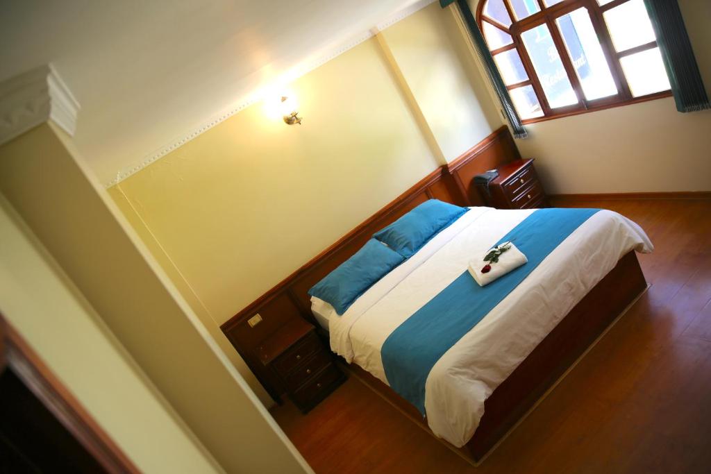 Postel nebo postele na pokoji v ubytování Hotel Donde Marcelo