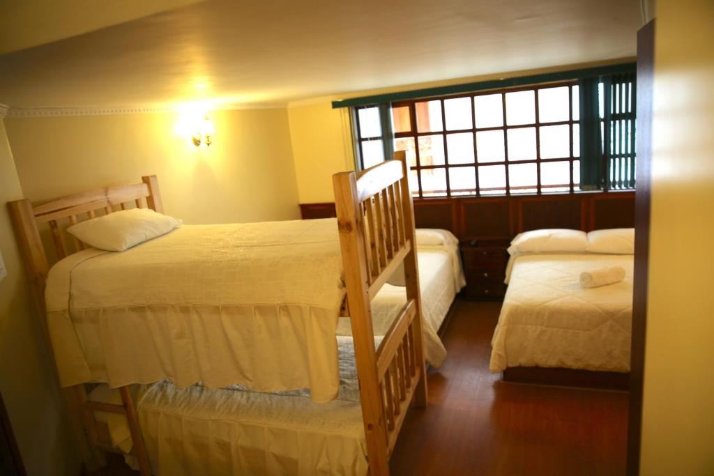 Postel nebo postele na pokoji v ubytování Hotel Donde Marcelo